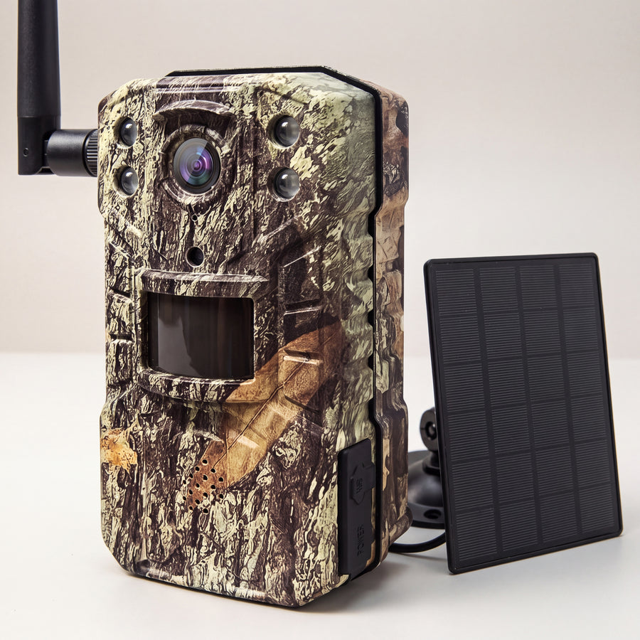 KelpieCam Ranger 4G solar trail camera in bark camo, close-up of the lens, infrared LEDs, motion sensor and solar panel