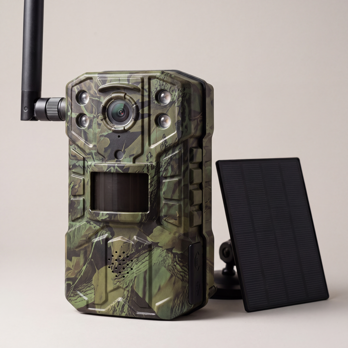 KelpieCam Ranger 4G solar trail camera in green camo, close-up with antenna and solar panel